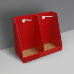 Présentoir de comptoir en carton rouge avec une séparation au milieu et 2 crochets/pegs fixes - rouge