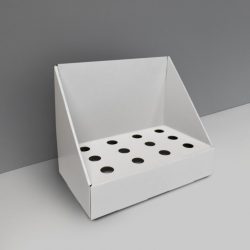 Angled Cardboard counter display with small slots/holes to hold cylindric products - white
