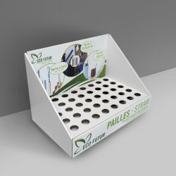 Angled Cardboard counter display with multiple small slots/holes to hold cylindric products - printed